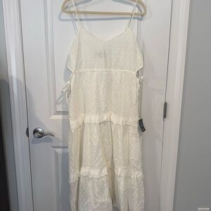 Elegant White eyelet Sleeveless Dress with side cutouts